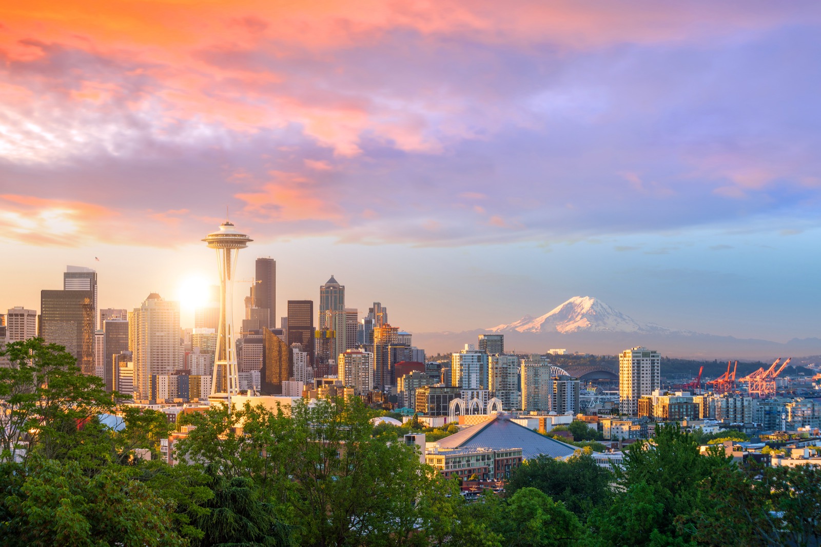 Seattle skyline at sunset with Space Needle and Mount Rainier — Yoline Construction service area